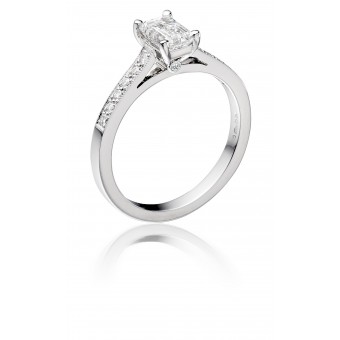 Platinum Duplice emerald cut diamond solitaire ring, diamond shoulders 0.93cts