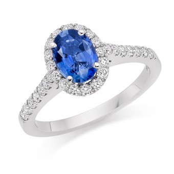 Platinum Pianeti oval sapphire and diamond halo ring, diamond shoulders 