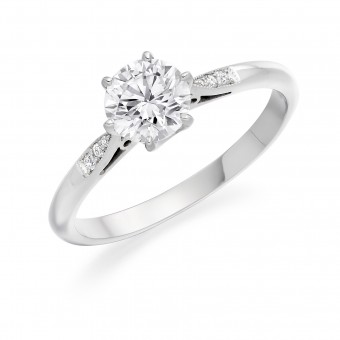 Platinum Serafina round cut diamond solitaire ring, diamond shoulders 0.85cts