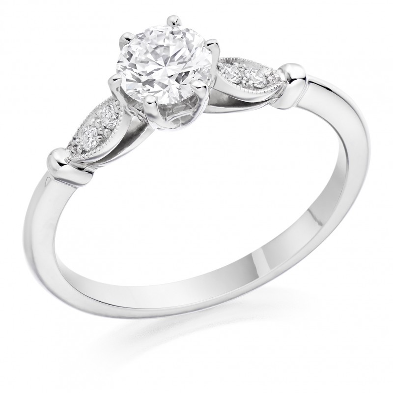 Platinum round cut diamond solitaire ring diamond shoulders 0.55cts