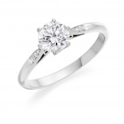 Platinum Serafina round cut diamond solitaire ring, diamond shoulders 0.46cts